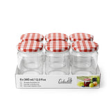 Barattoli di vetro, sei, con coperchio a scacchi bianchi e rossi, nella loro confezione