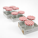 Barattoli di vetro, di diverse misure in confezioni da due, da tre e da 4, con coperchio a scacchi bianchi e rossi