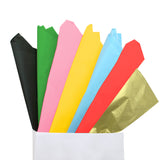 Carta velina di vari colore che esce da un sacchetto bianco