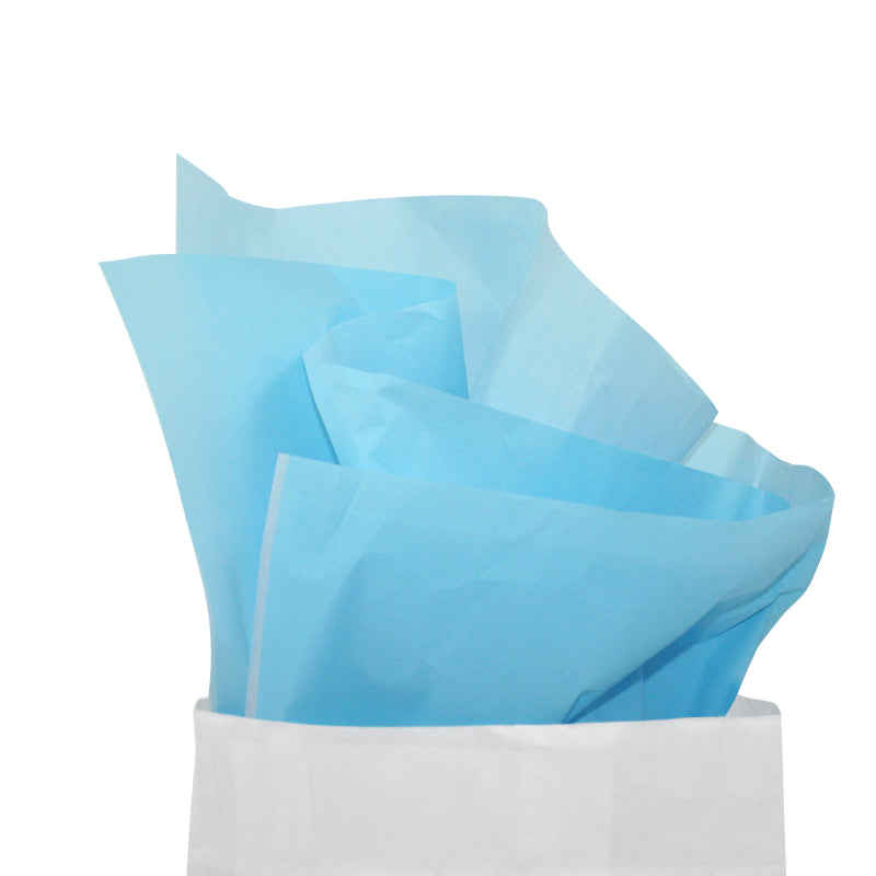 Carta velina azzurra che esce da un sacchetto bianco