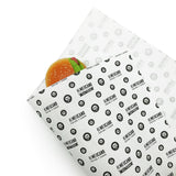 Carta politenata bianca stampata con personalizzazioni, che avvolge un panino