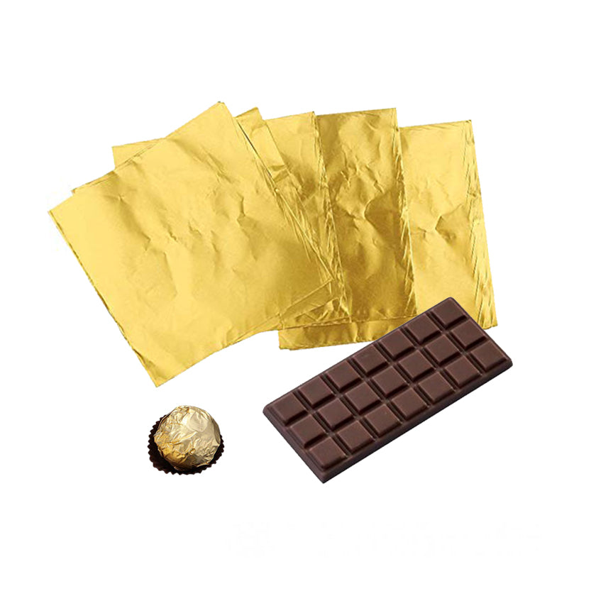 carta alluminio dorata per cioccolato, con barretta di cioccolato e ferrero roche