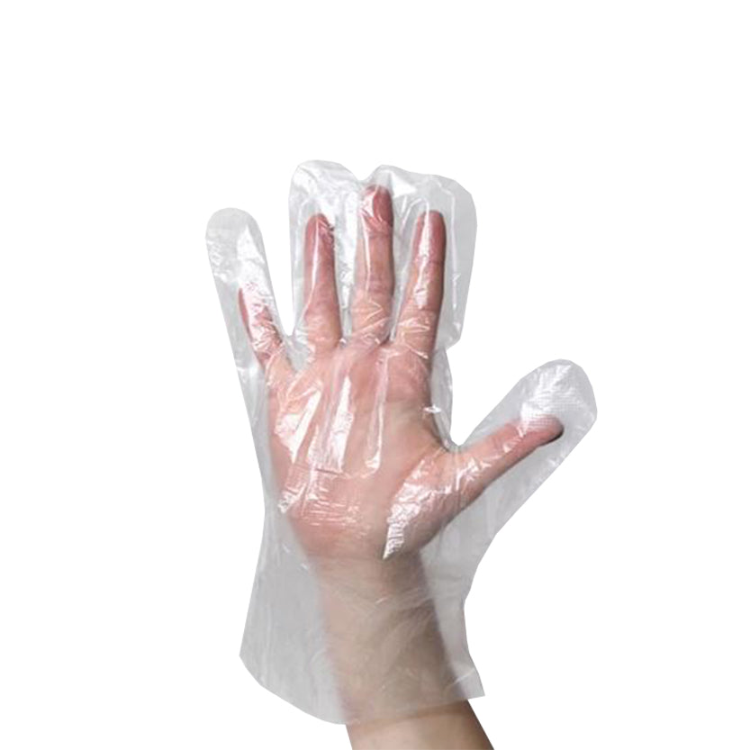 Mano che indossa guanto monouso trasparente