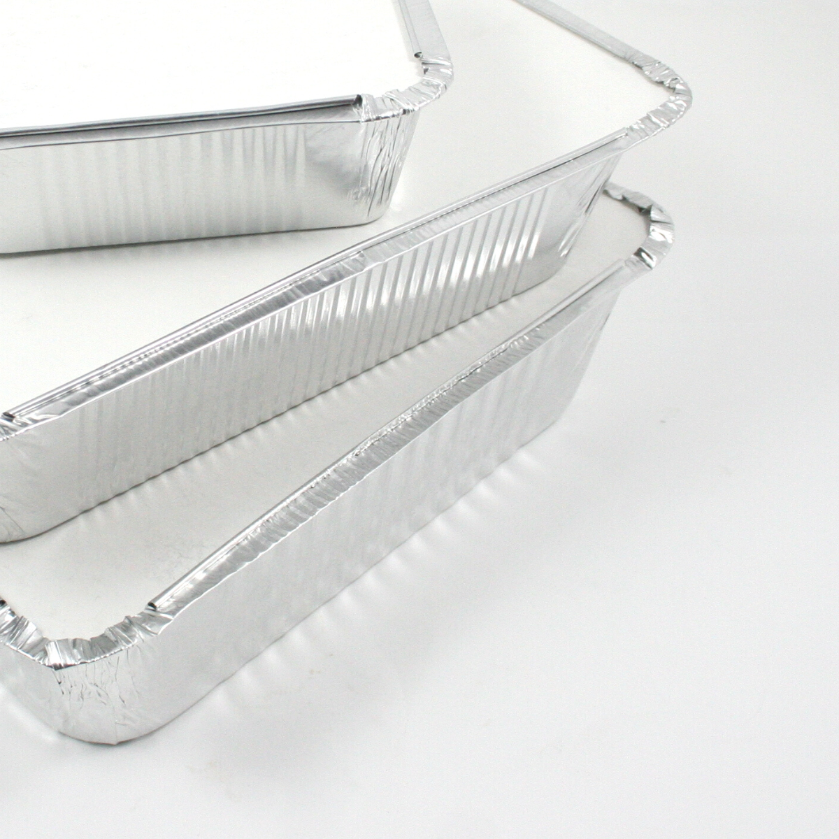 vaschette di alluminio chiuse ed impilate