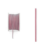 Nastro rosa nella sua bobina 