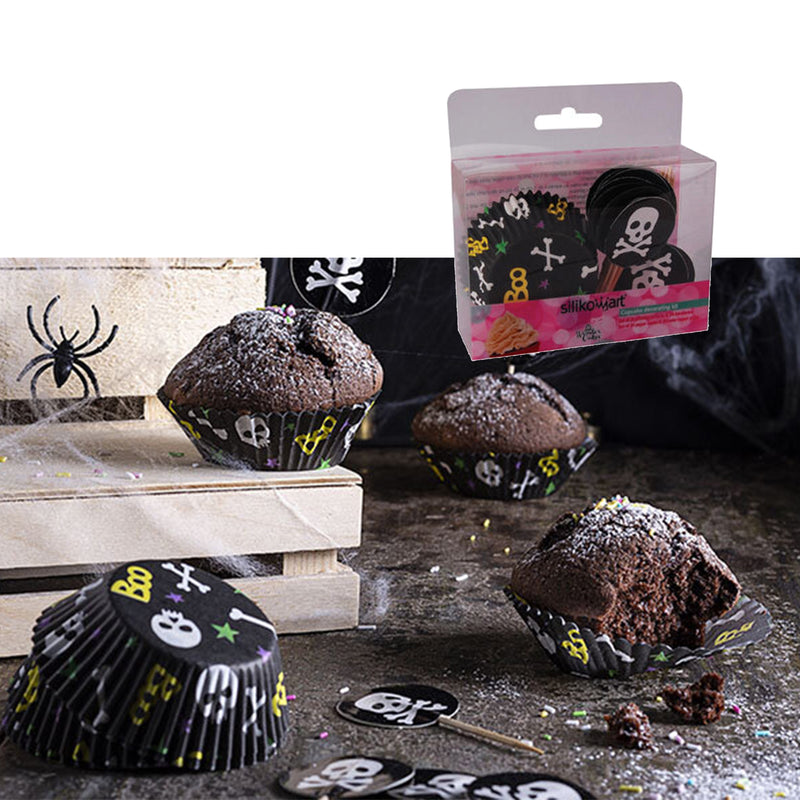 Insieme di muffin dentro pirottini a tema halloween