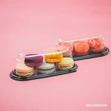 Confezioni base nera coperchio trasparente con macarons