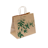 Shopper di carta avana con foglie verdi stampate