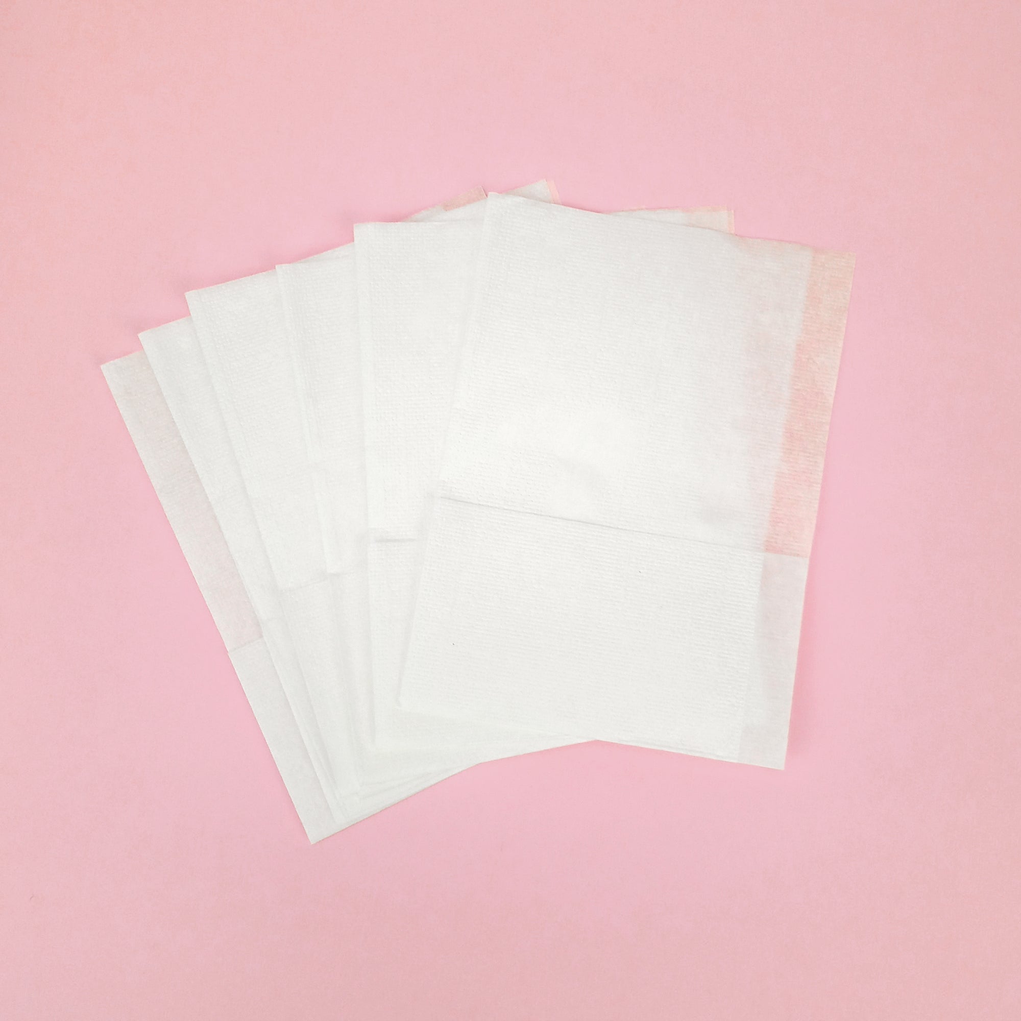 Tovagliolini bar su sfondo rosa