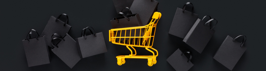 Carrello della spesa giallo su sfondo nero 