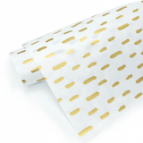 Dettaglio carta alimentare bianca con grafiche dorate 