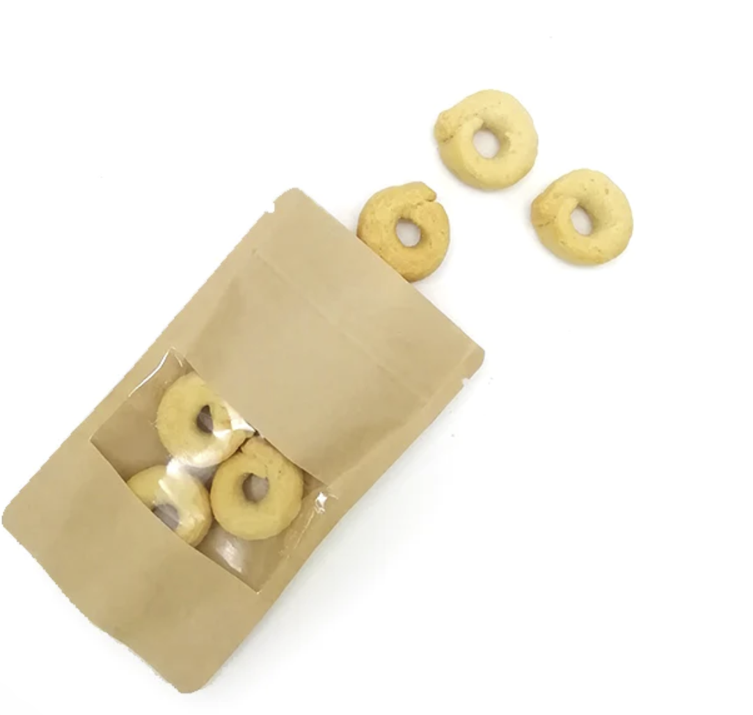 Sacchetto di carta color avana con finestra pieno di taralli 