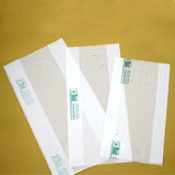 Shopper bianche biodegradabili, tre diverse misure, stese 