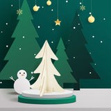 Albero di natale in cartone color verde, e bianco, mostrato allestito, nelle sua varianti di dimensione e colore