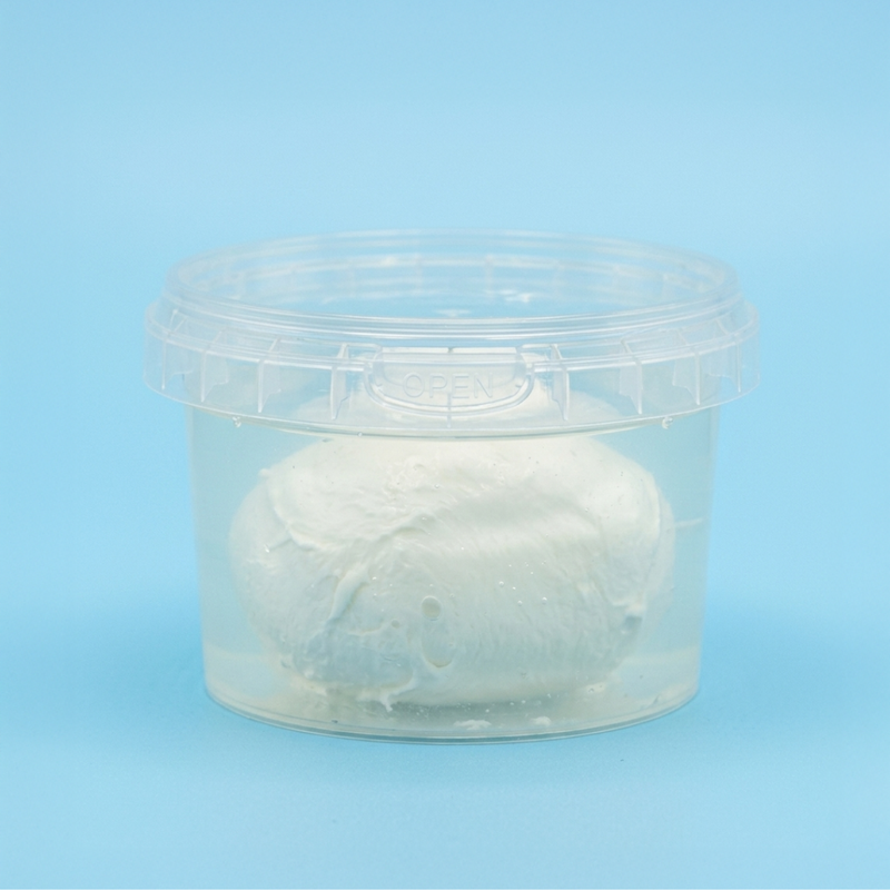 Barattolo tondo con coperchio a chiusura ermetica, trasparente, con dentro mozzarella