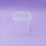 Barattolo chiusura ermetica per alimenti trasparente base quadrata su sfondo fotografico viola