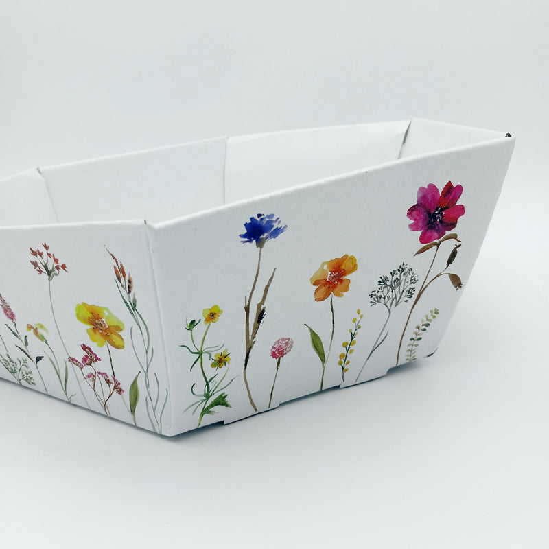 Cesto esagonale bianco con fantasie primaverili floreali . Dettaglio