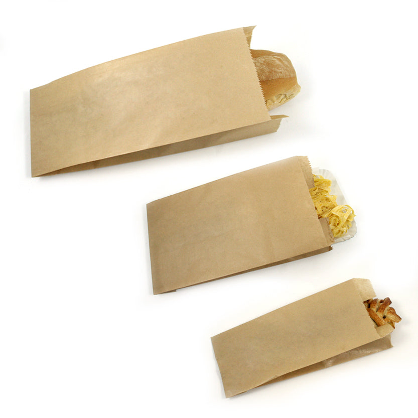 Sacchetti di carta, avana, varie misure, pieni di cibo 
