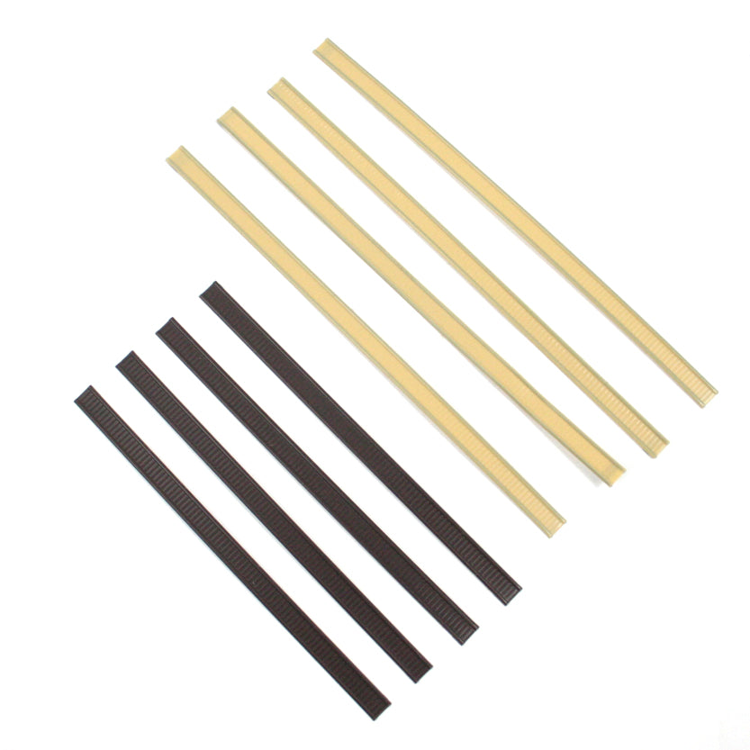 Fascette chiudi pacco, nere e bianche, due diverse misure, stese