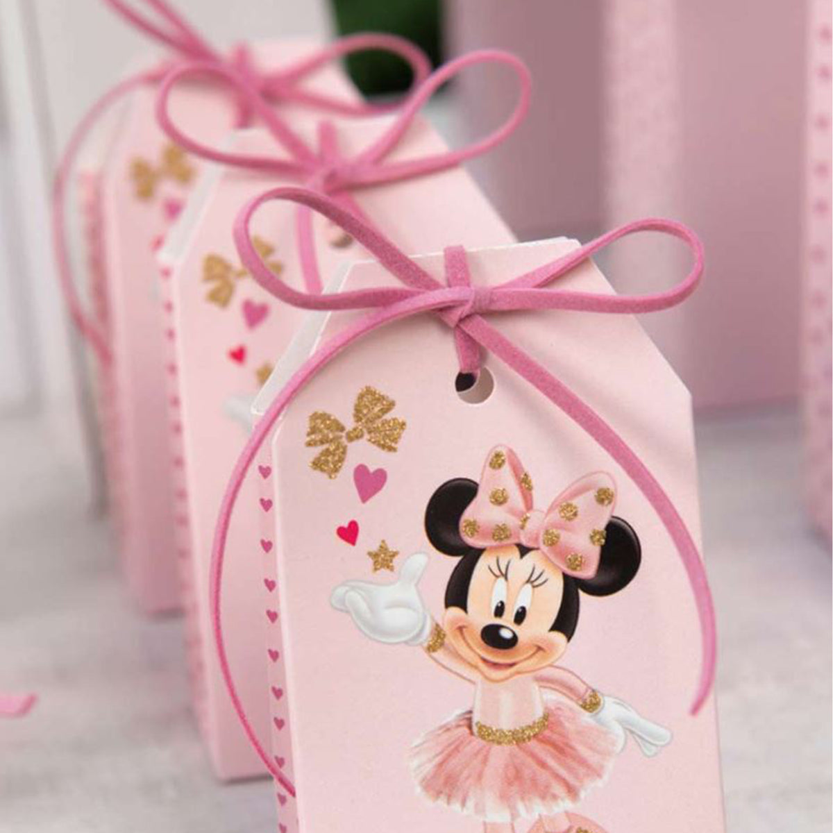 Confezioni piccole e rosa con Minnie e fiocchetti rosa