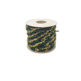 Rotolo di nastro decorativo verde ed oro 