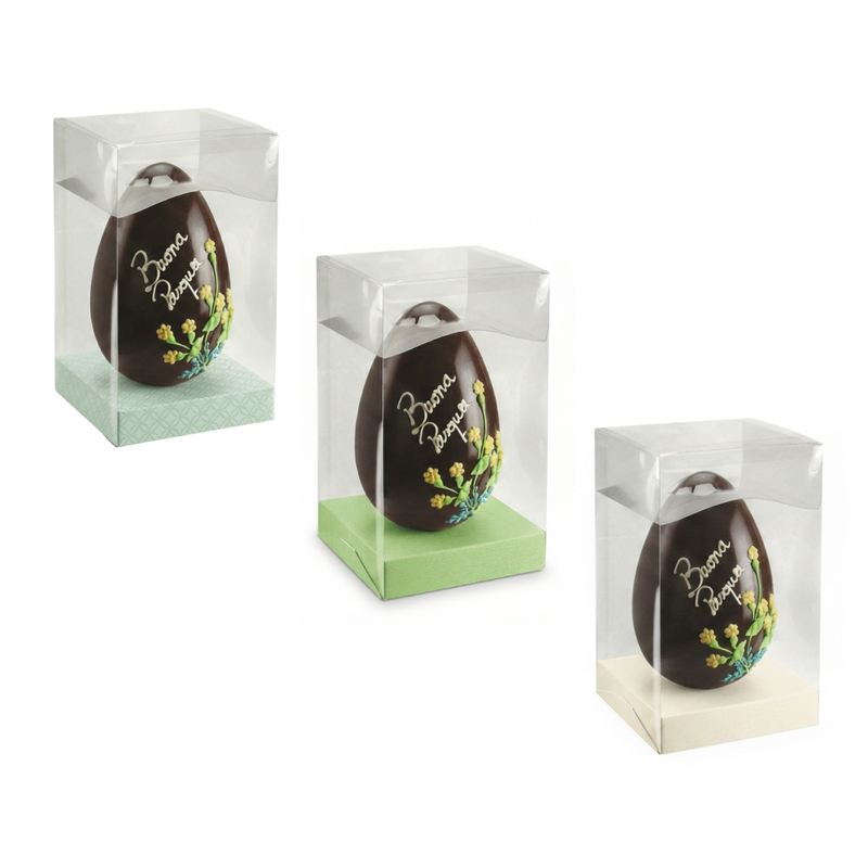 Portauova di pasqua, trasparenti e cubici con base colorata  con dentro uovo di cioccolata 