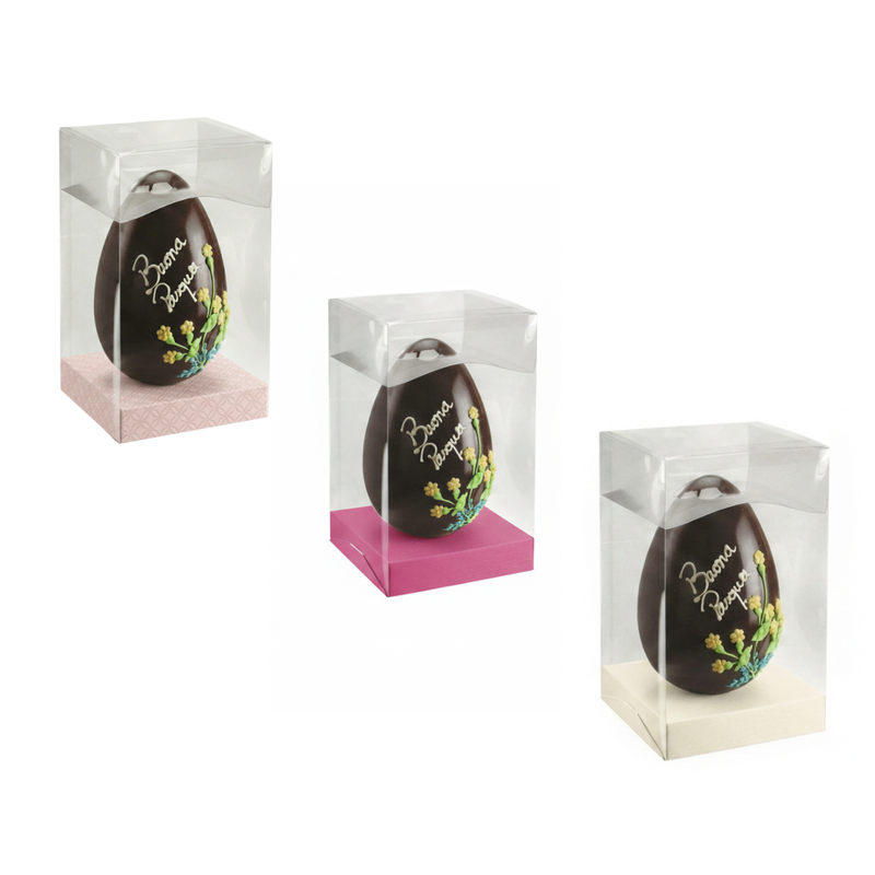 Portauova di pasqua, trasparenti e cubici con base colorata  con dentro uovo di cioccolata 