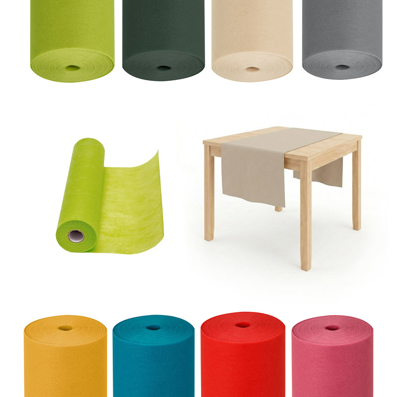 Insieme di vari rotoli di runner di diversi colori ed un tavolino 