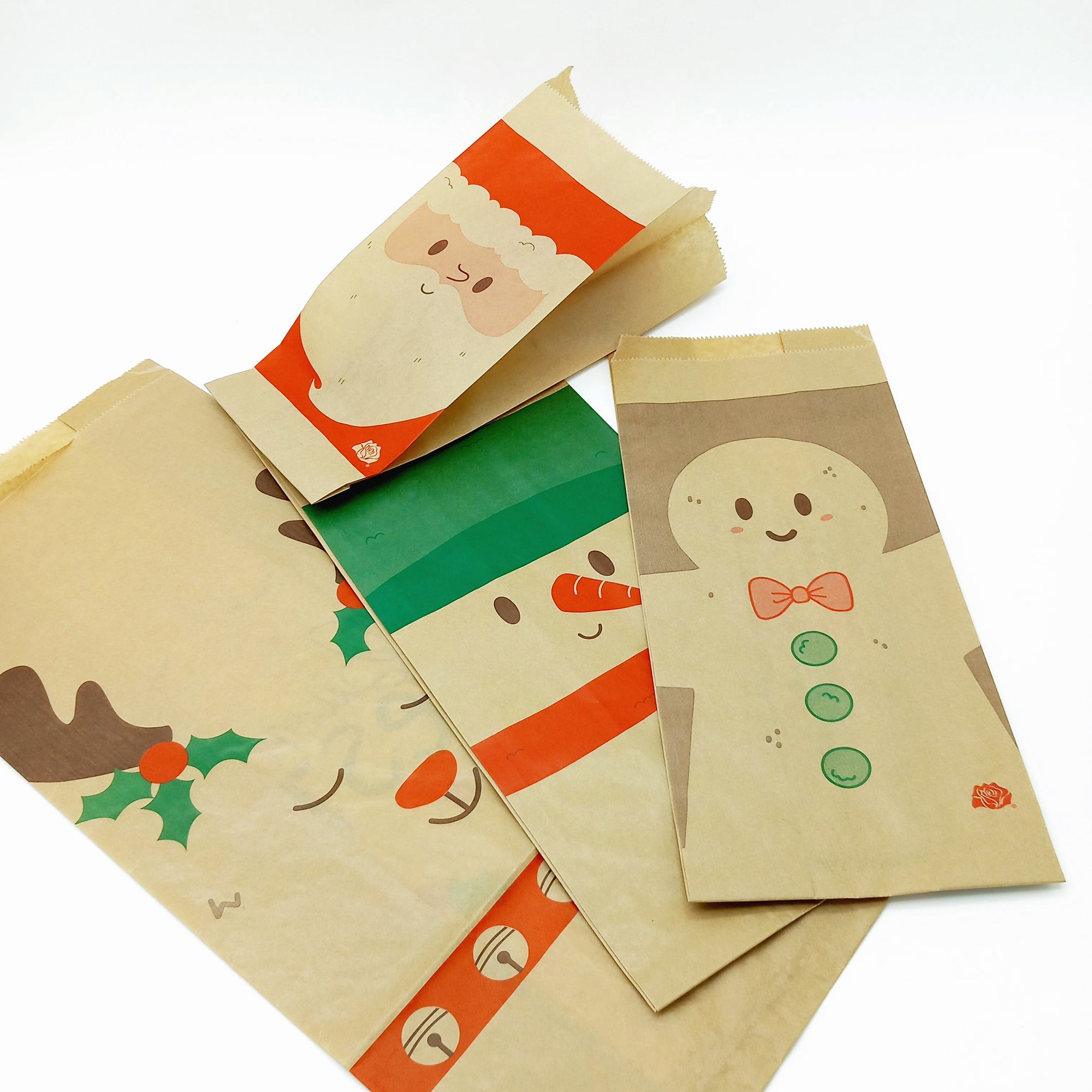 Sacchetti avana con fantasie natalizie, diverse grafiche e diverse forme