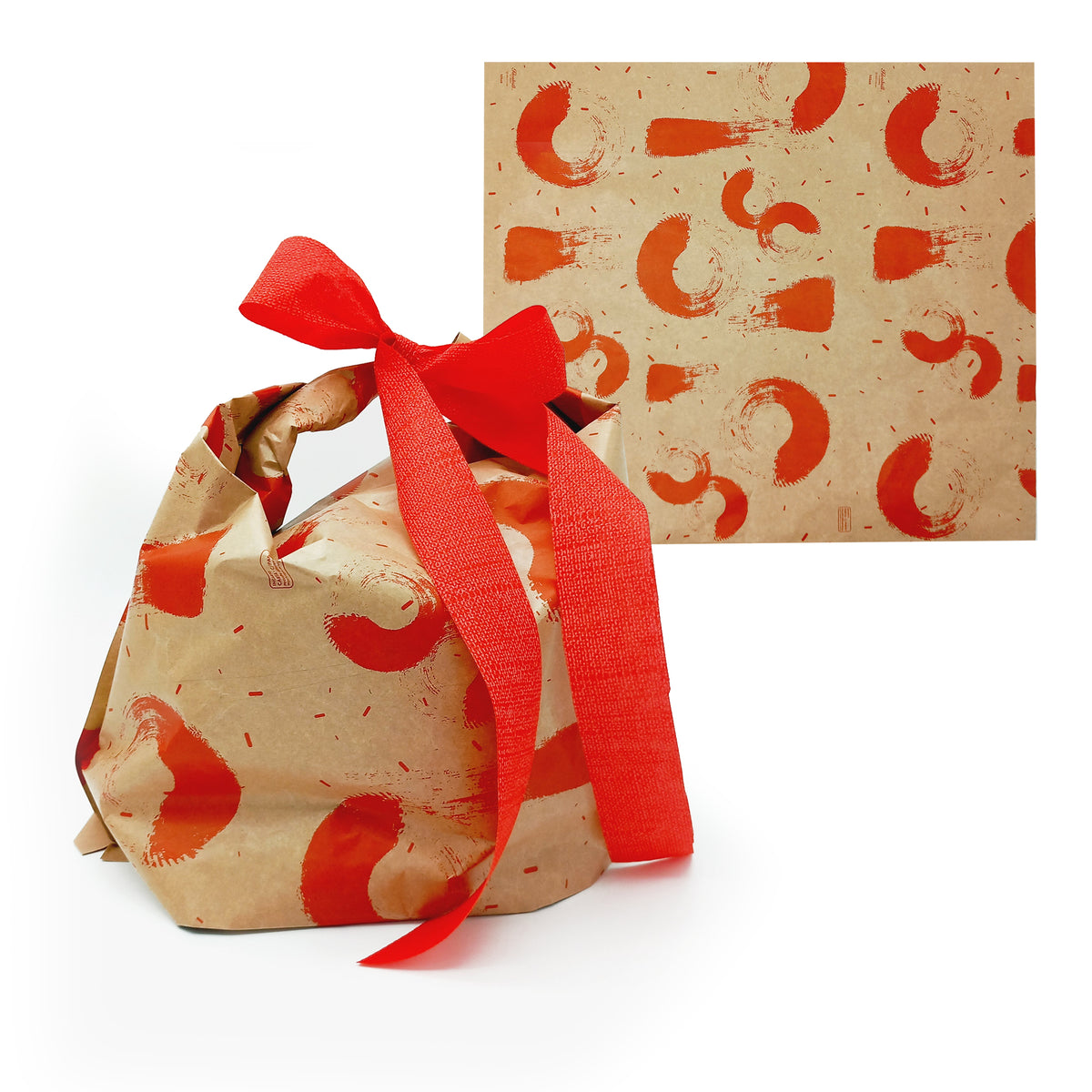 Sacchetto porta panettone avana e rosso con panettone dentro e steso
