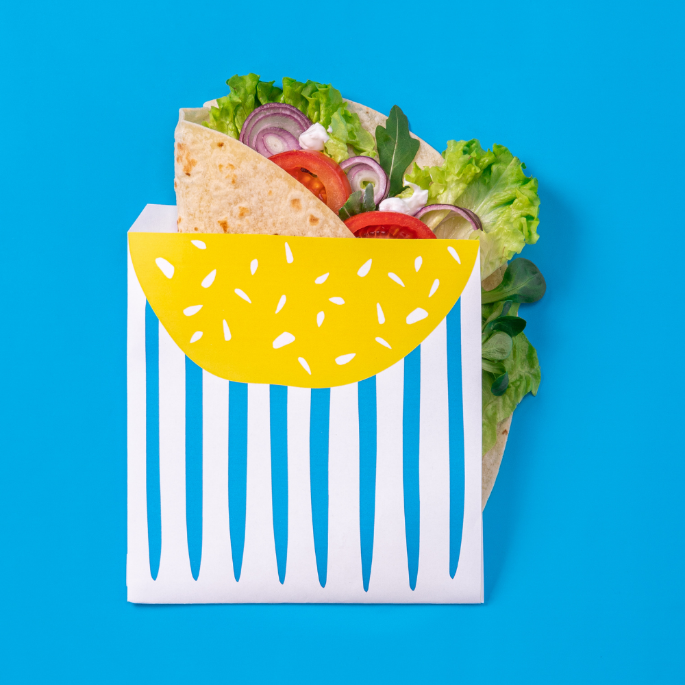 Sacchetto per alimenti in carta antigrasso aperto su due lati per panini  con stampe colorate