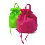 Sacchetto porta colomba pasquale  e porta panettone mostrato nella versione verde e e nella versione fucsia 