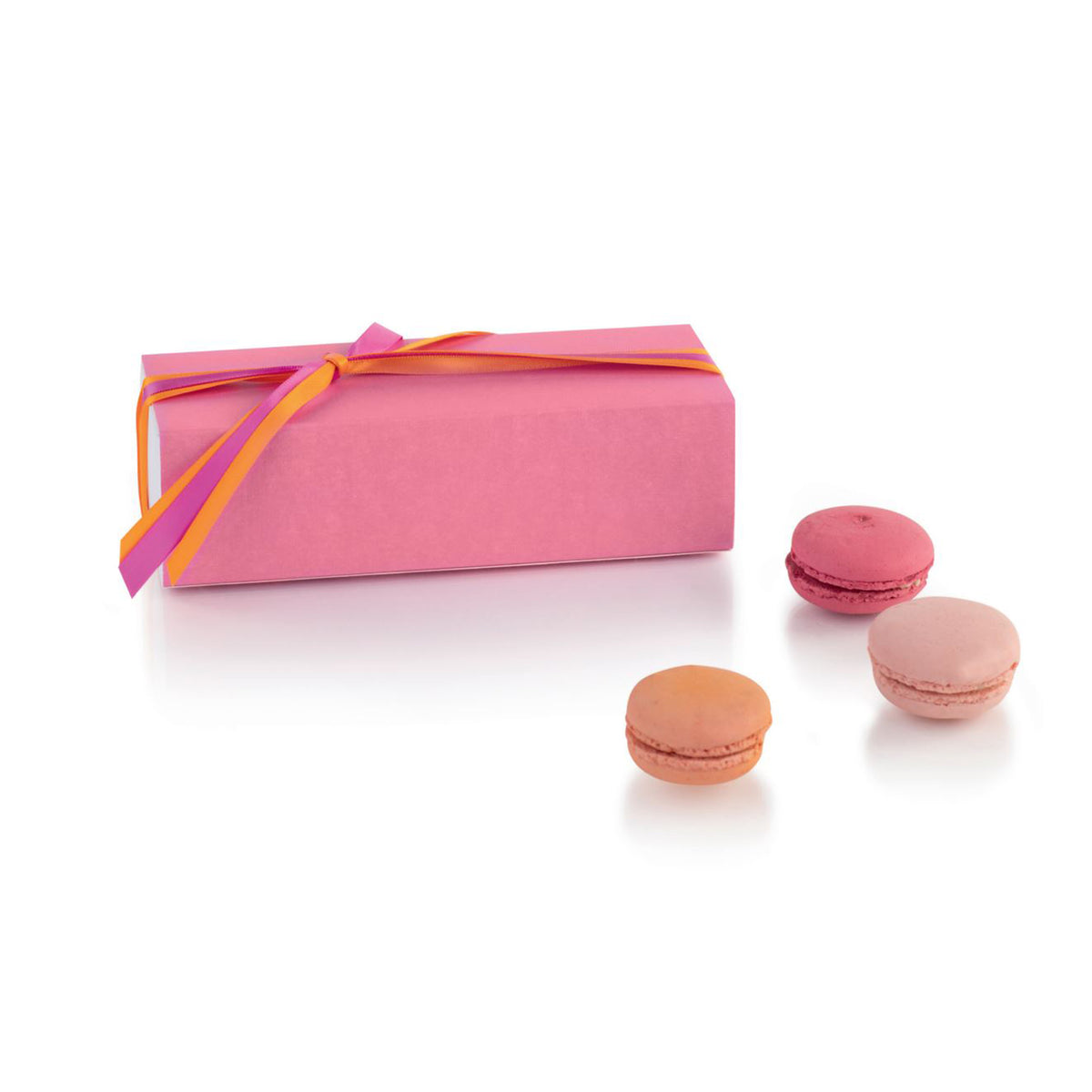 Scatola astuccio color fucsia con fiocco e tre macarons