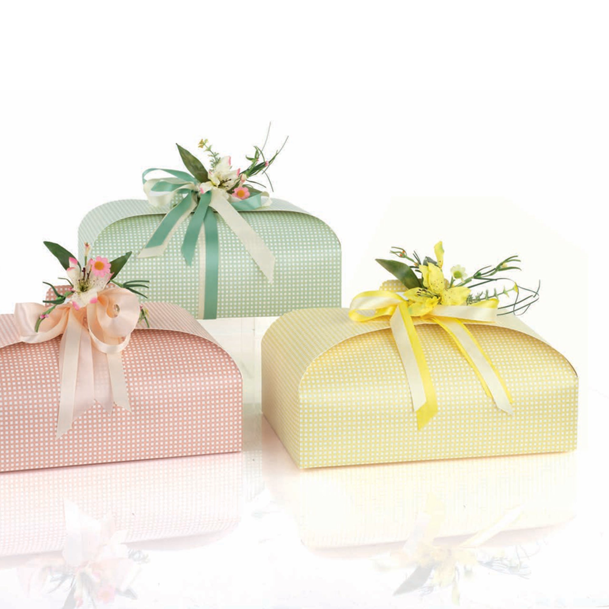 Scatole porta colomba a quadretti colore giallo, verde e rosa con fiori sopra 