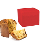 Scatola rossa porta panettone con vicino panettone