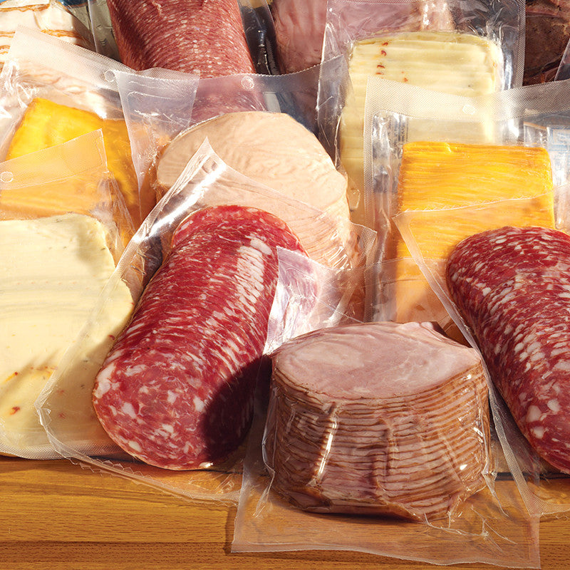 Insieme di prodotti alimentari mostrati sottovuoto