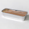 Stampo in alluminio per plumcake con all'interno un dolce