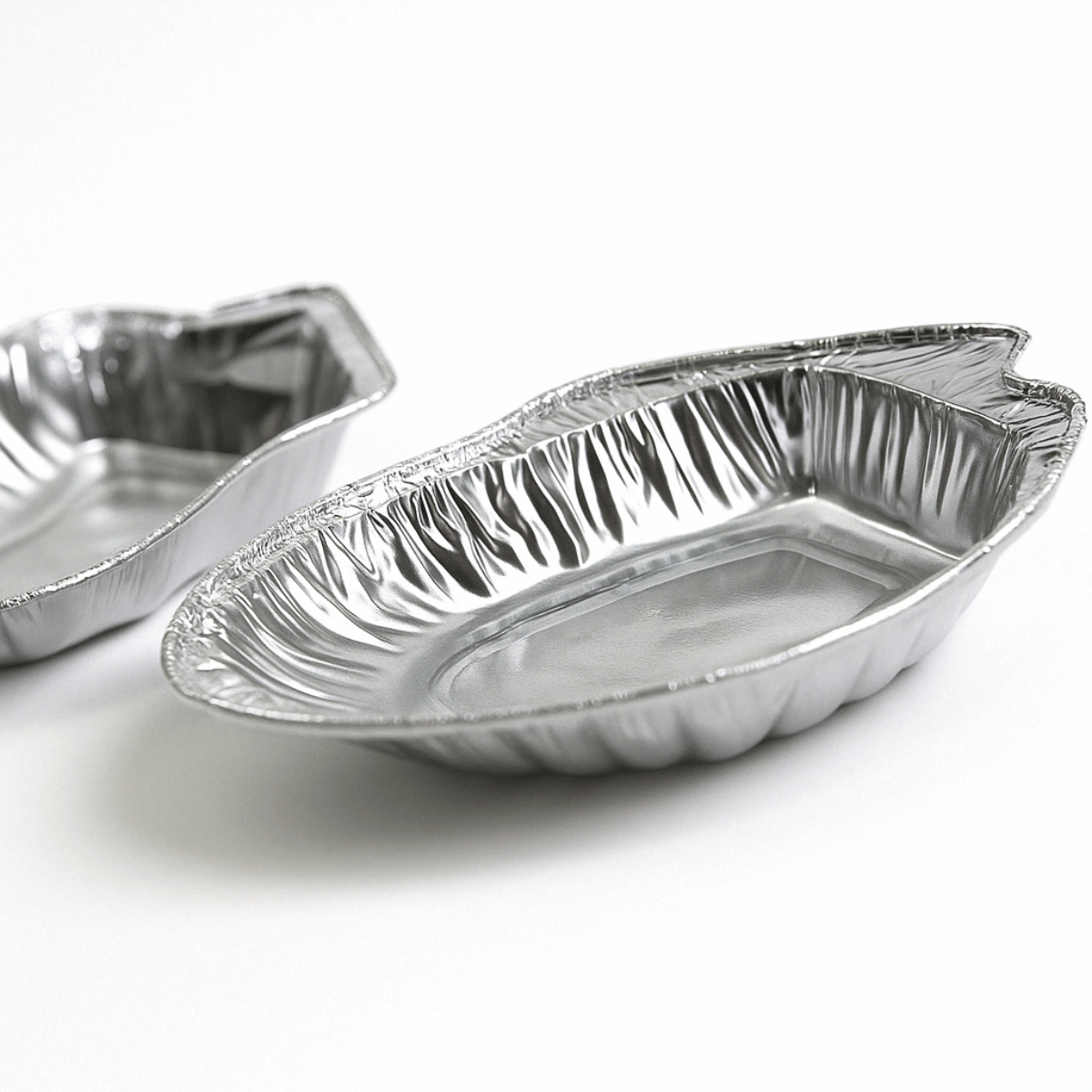 Stampo in alluminio per alimenti a forma di conchiglia vuoto