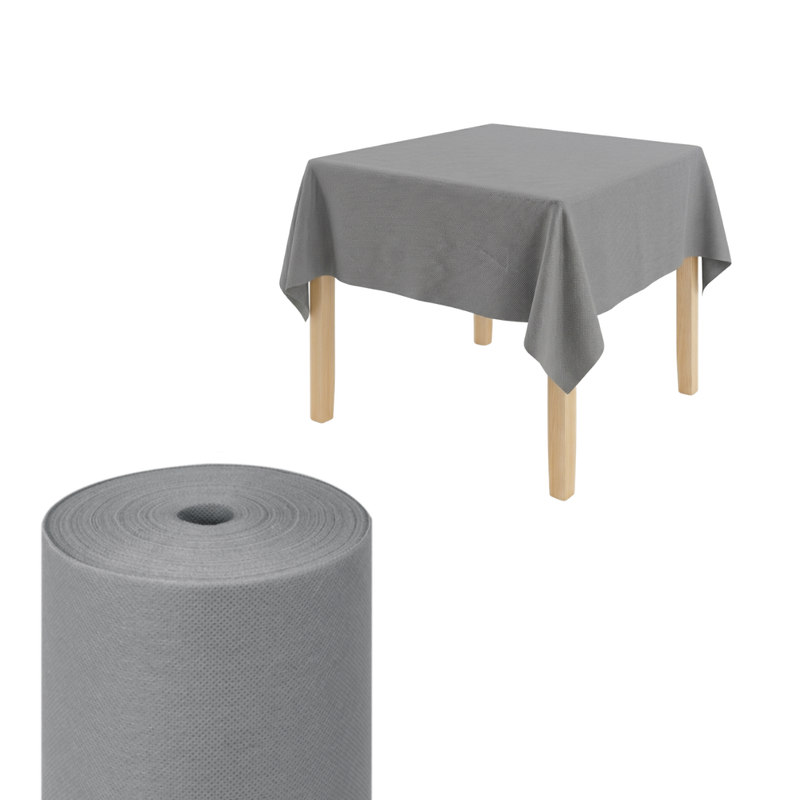 Tavolino di legno con sopra tovaglia monouso  e rotolo color grigio