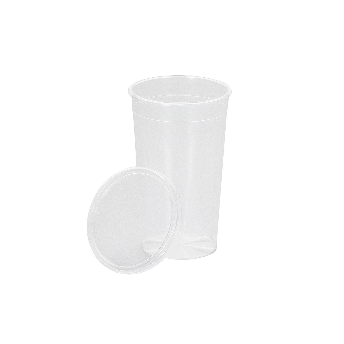 Bicchiere bianco con tappo appoggiato di lato