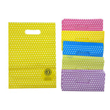 Sacchettini di vari colori, a pois bianchi e manico a fagiolo 