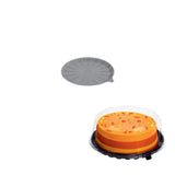 Confezione sottotorta di plastica e coperchio trasparente e torta dentro 