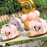 Tavolo con scatoline rosa con Minnie