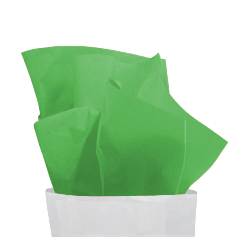 Carta velina verde che esce da un sacchetto bianco 