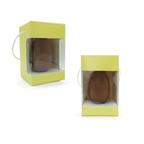 Scatola per uovo di Pasqua di cartone verde con finestra e manico in cordoncino, una vuota ed una piena 