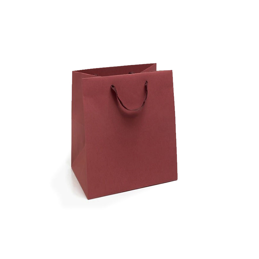 Shopper di carta con manico in nastro color rosso bordeaux