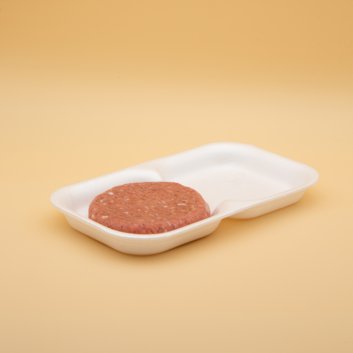 Vaschette per hamburger in polistirolo bianco., due scomparti, con un hamburger dentro 