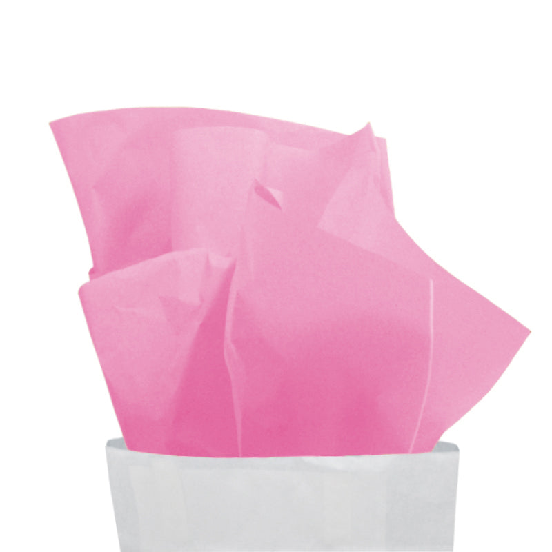 Carta velina rosa che esce da un sacchetto bianco 