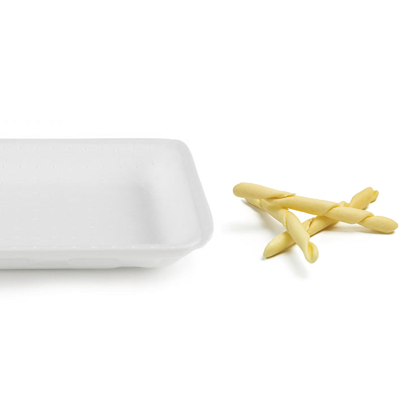 Vassoio bianco in polistirolo con vicino 3 strozzapreti