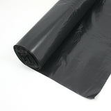 dettaglio di rotolo di buste nere per immondizia